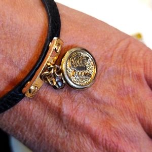Beautiful faux leather and gold Scorpio charm bracelet.